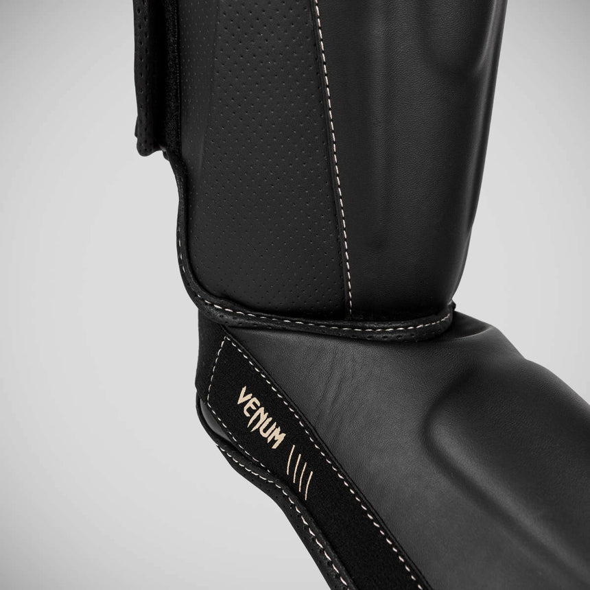 Black Venum Impact Evo Shin Guards    at Bytomic Trade and Wholesale