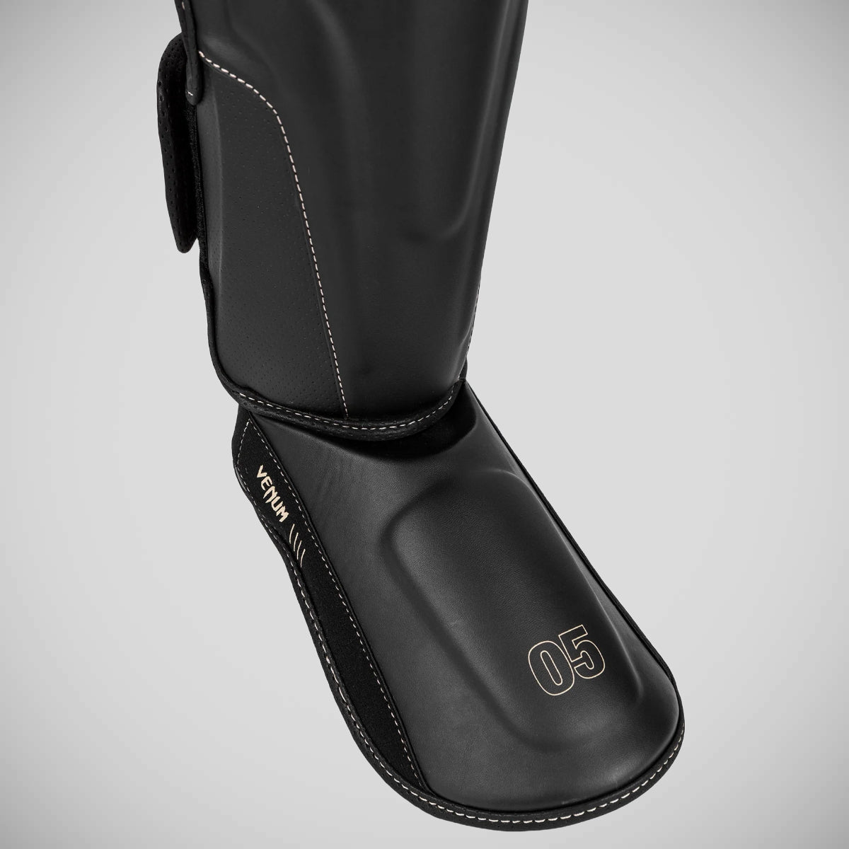 Black Venum Impact Evo Shin Guards    at Bytomic Trade and Wholesale